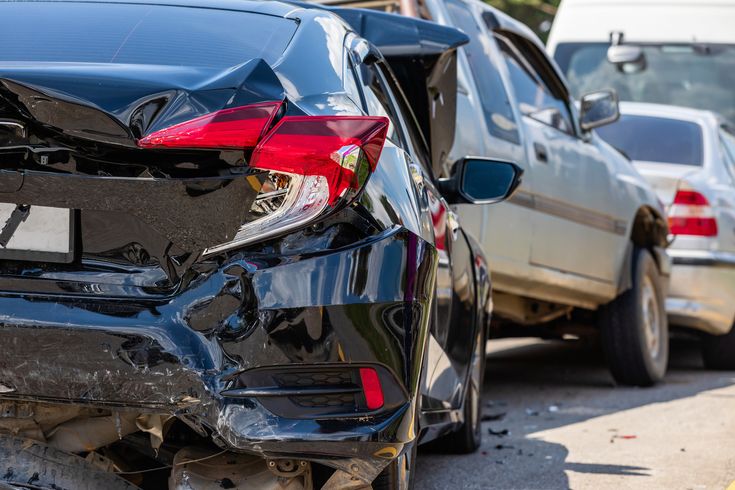 two cars crashing into each other