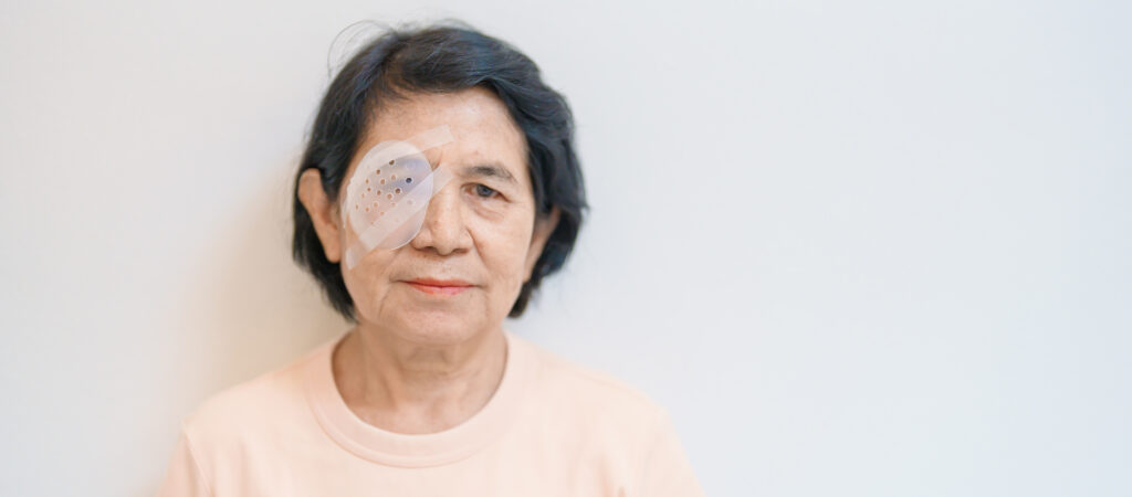 Woman with eye patch on